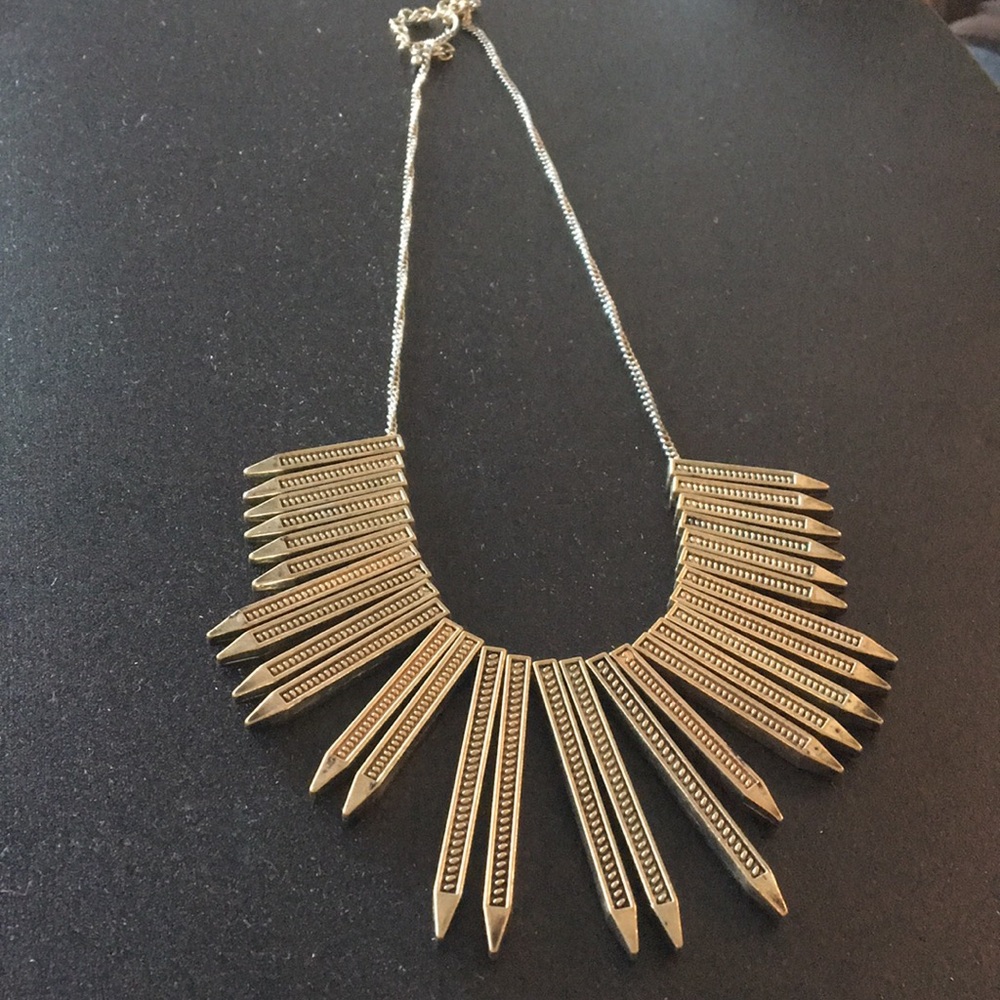 Gold spiked and fringe statement necklace